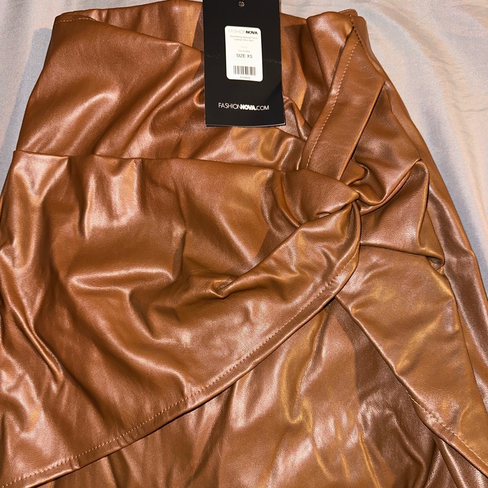 Brand new fashion nova leather skirt.